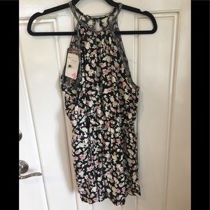 Loose and airy floral romper brand new with tags